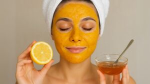 A bowl of face mask mixture made of honey, lemon juice, and turmeric