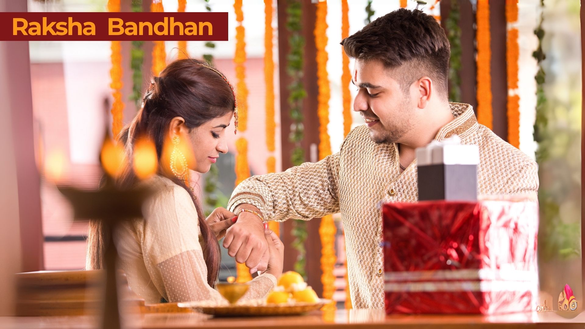 Sister tying a rakhi on her brother’s wrist during Raksha Bandhan celebration